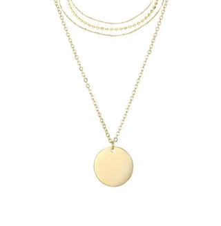 This 4 Layer Coin Necklace is a must-have fashion accessory, perfect for effortlessly elevating any outfit. With its trendy and versatile design, this gold necklace can be worn for any occasion, making it the ideal gift for yourself or a loved one. Add a touch of sophistication and style with its layered coin design. Layered in gold fill this set gives an effortless refined look day or night.